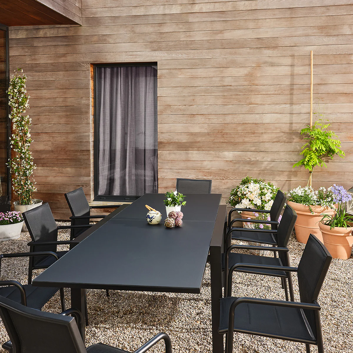 Conjunto de jardín de aluminio y textilene extensible negro para 6-10 personas. - Image 3