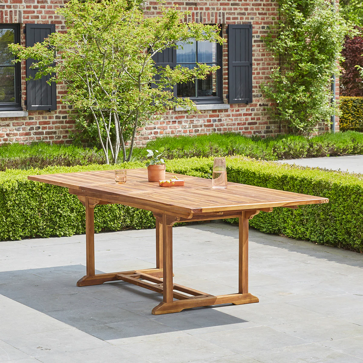 Mesa de exterior extensible de teca maciza aceitada para 8/10 pers.