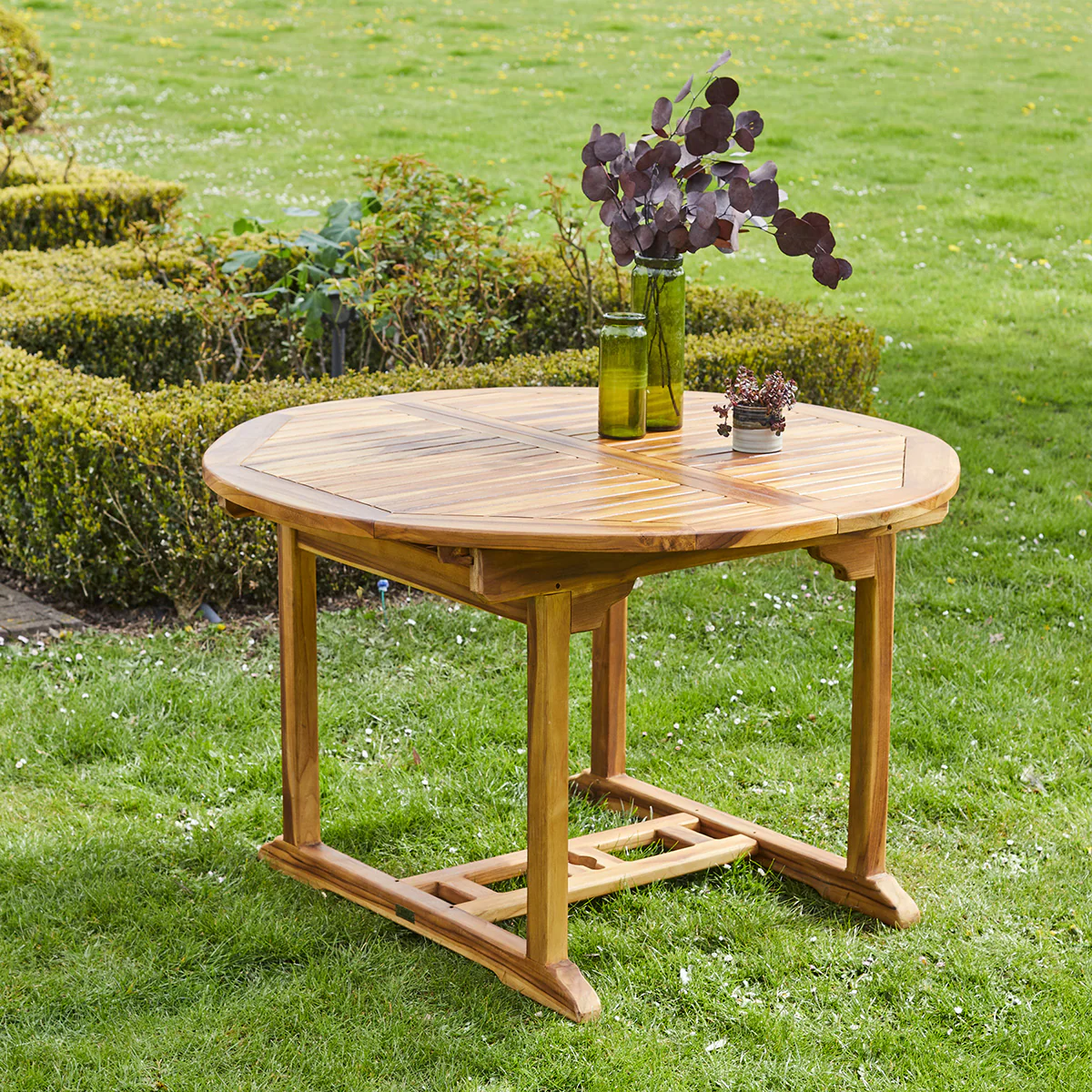 Mesa de exterior ovalada extensible de teca maciza para 6/8 pers. - Image 3