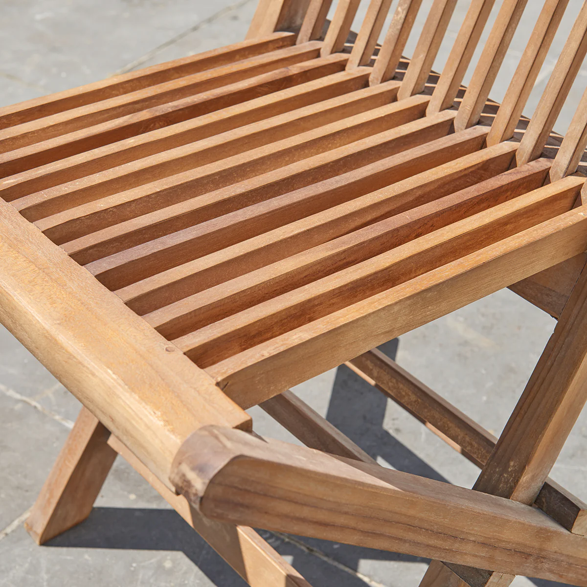 Silla de exterior plegable de teca maciza aceitada - Image 5